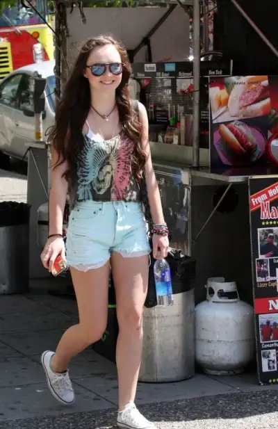 Madeline Carroll's Casual Stroll in Vancouver: A Day of Charm on July 8, 2012