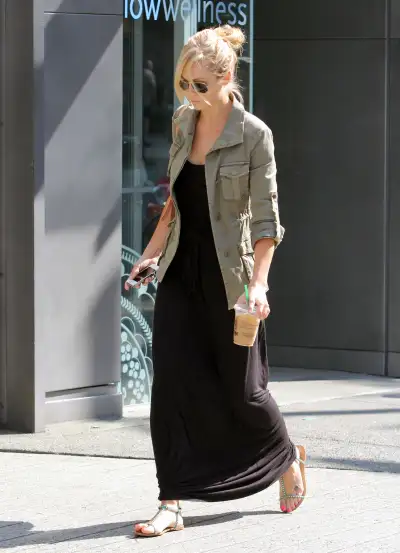 Laura Vandervoort in Vancouver: A Stylish Walk in a Black Long Dress